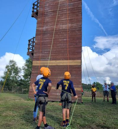 boys at COPE climbing tower