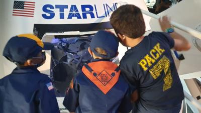 boys at space capsule